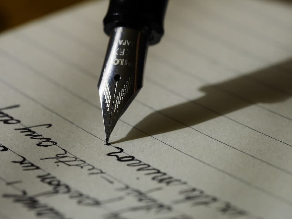Journal and pen — Krishnan's written reflections